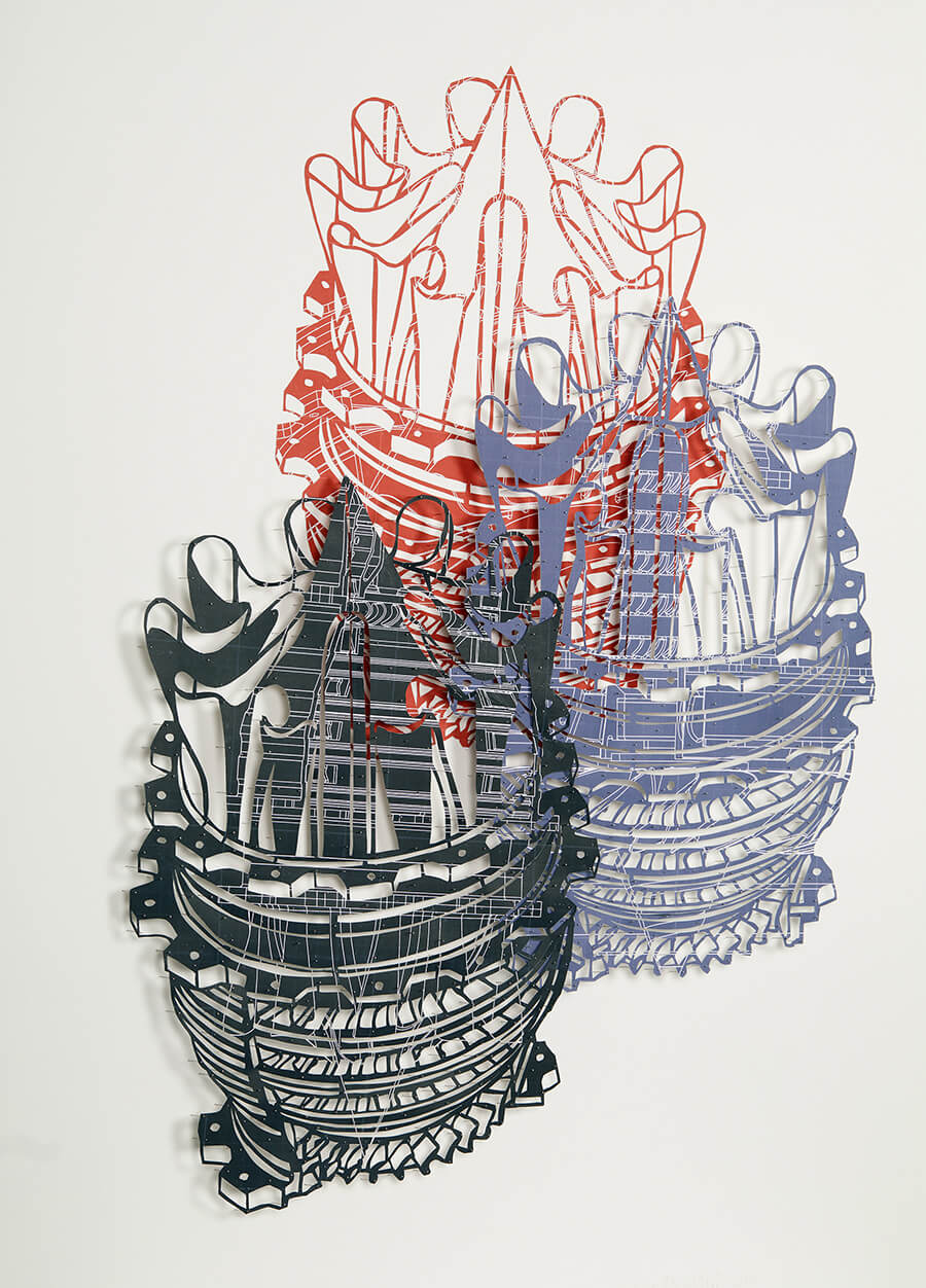 "Burning From Within II by Claire Brewster. A large-scale wall-mounted paper sculpture measuring 122cm by 91.5cm. The artwork features three overlapping layers of hand-cut digital archival prints in red, purple-blue, and black. The intricate cutouts depict the abstract, skeletal side-profile of a gas turbine generator, mounted with pins to create depth and shadows against a white wall."