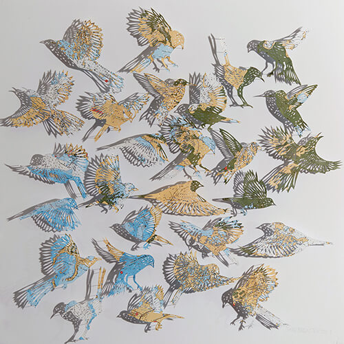 "A Confluence by Claire Brewster. A paper sculpture featuring a swirling flock of birds hand-cut from a vintage map of Florida in blue, tan, and green tones, commissioned for the Orlando Championsgate hotel."